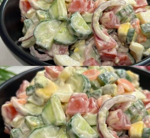 Sliced tomatoes and cucumbers marinated in olive oil